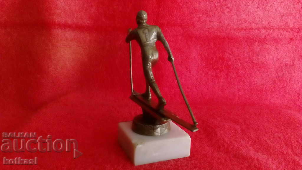Auction Metal alloy white bronze aluminum figure of a Skier Auction Metal alloy white bronze aluminum figure of a Skier