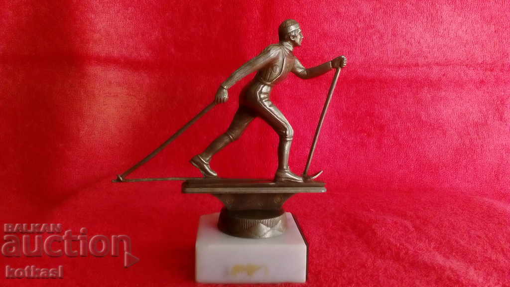 Metal alloy white bronze aluminum figure of a Skier Metal alloy white bronze aluminum figure of a Skier