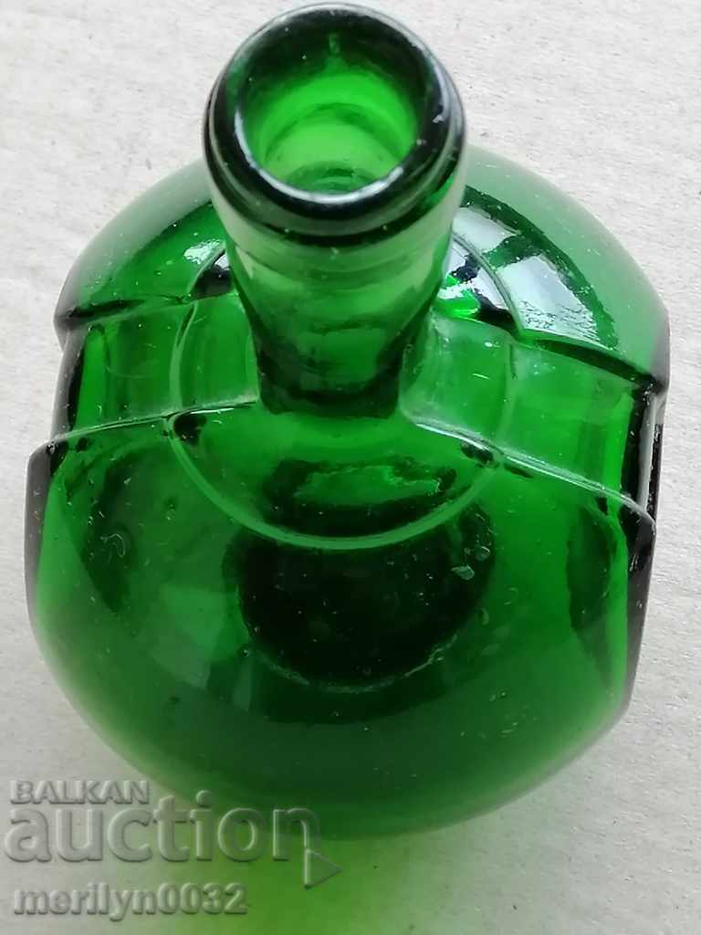 Auction A glass bottle of Benedectin cognac Auction A glass bottle of Benedectin cognac