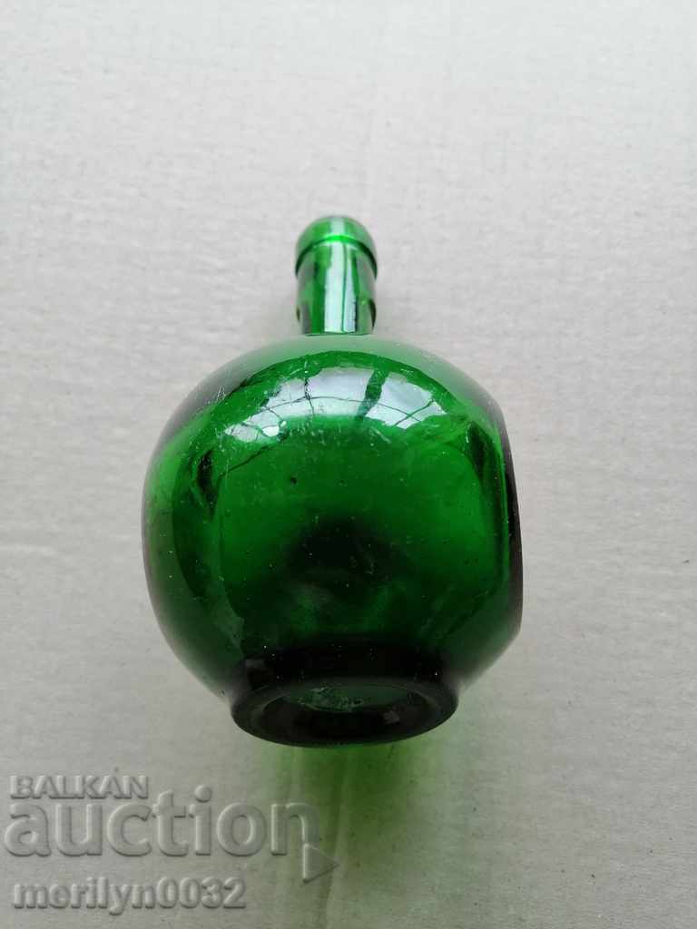 Delivery of A glass bottle of Benedectin cognac Delivery of A glass bottle of Benedectin cognac