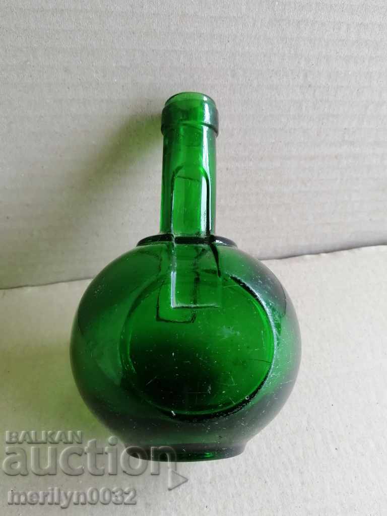 A glass bottle of Benedectin cognac