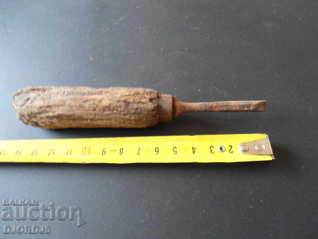 Old screwdriver, wooden handle with price 2.00 BGN | € 1.02 Old screwdriver, wooden handle with price 2.00 BGN | € 1.02
