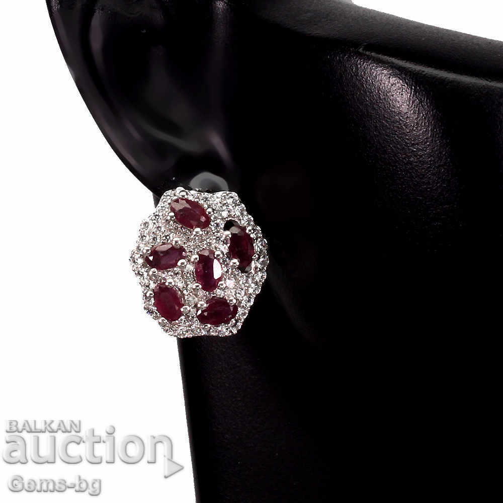 Σετ σκουλαρικιών και δαχτυλιδιών με ρουμπίνια και ζιργκόν με τιμή 150.00 BGN | € 76.69 Σετ σκουλαρικιών και δαχτυλιδιών με ρουμπίνια και ζιργκόν με τιμή 150.00 BGN | € 76.69