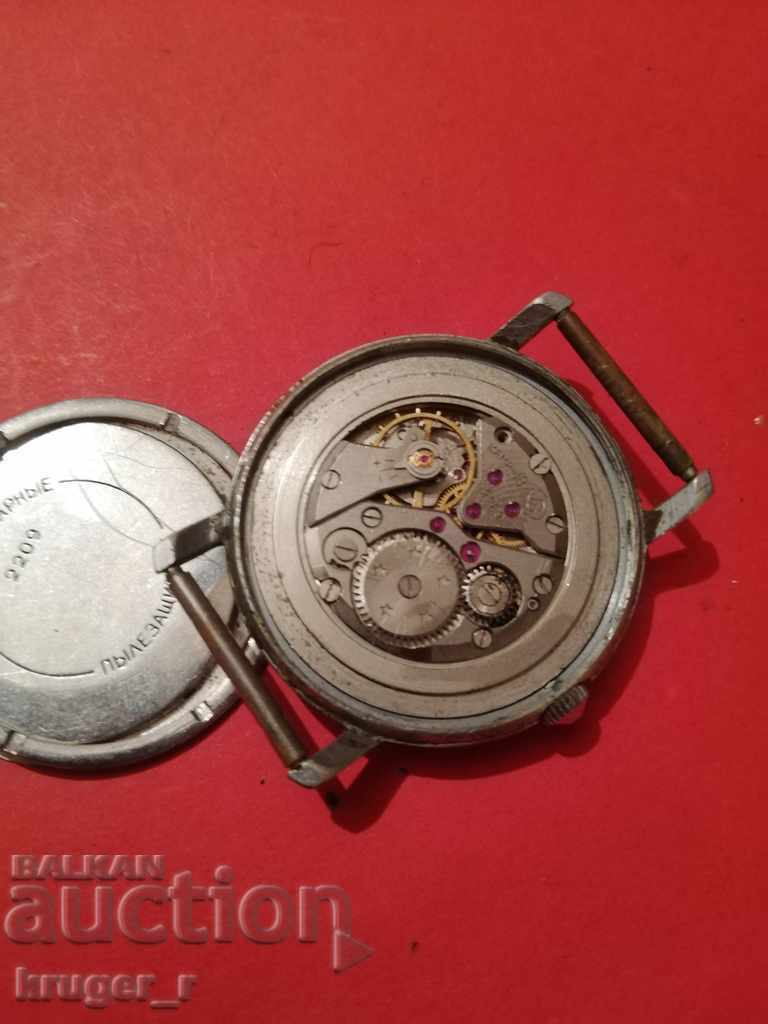 Auction  Old clock EAST.