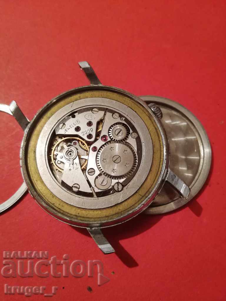 Auction  Old clock EAST.