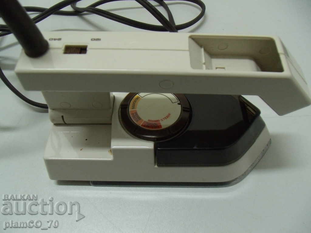 Delivery of No. * 3831 NORELCO's old little tourist iron