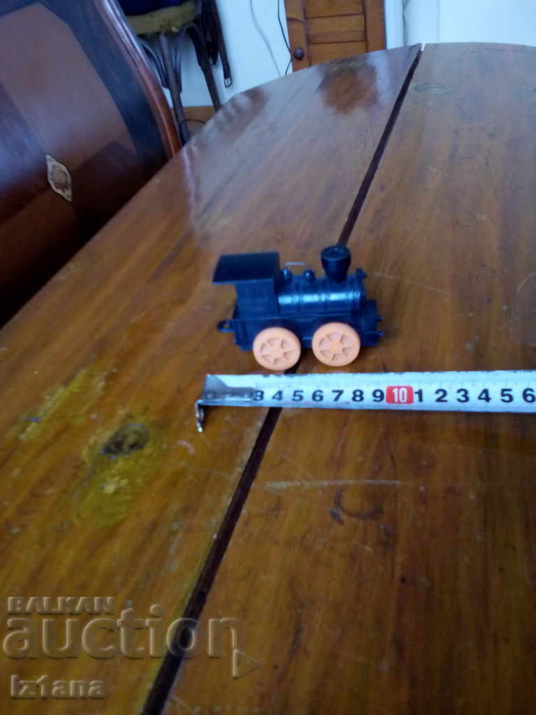 Auction Old toy locomotive, roller coaster Auction Old toy locomotive, roller coaster