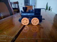 Old toy locomotive, roller coaster