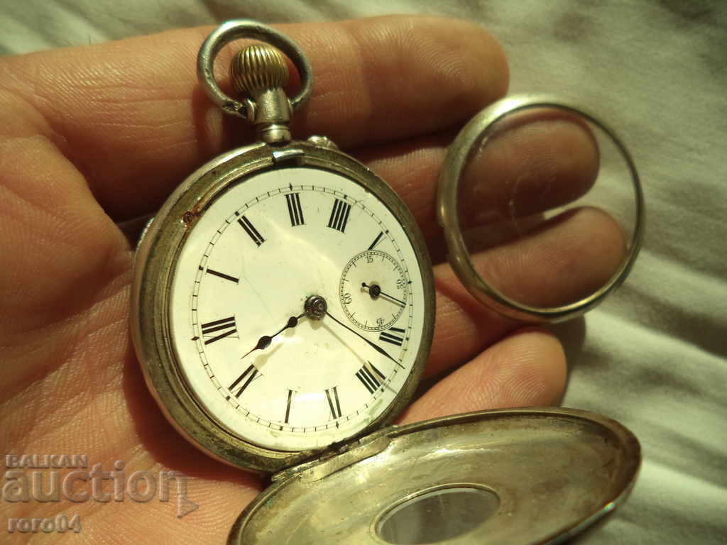 Auction SILVER POCKET CLOCK WITH NUMBER 77555 Auction SILVER POCKET CLOCK WITH NUMBER 77555