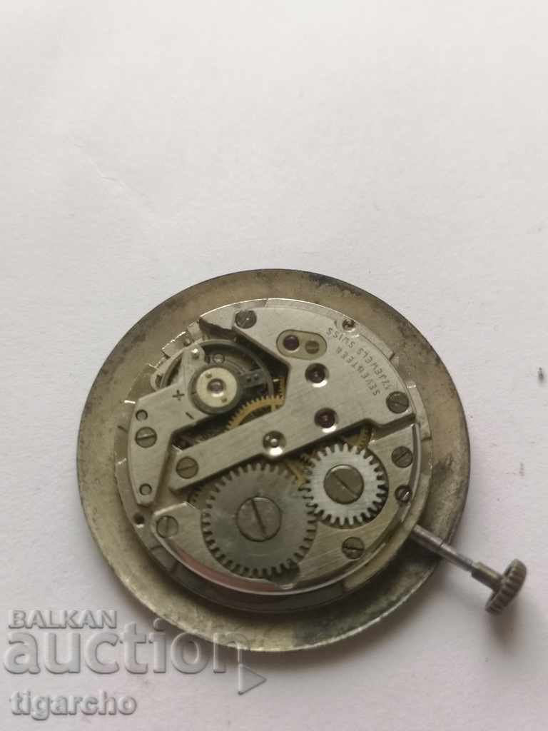 Auction  Swiss watch machine.