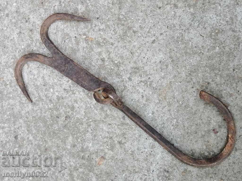 An old forged scraping hook, double twin with price 34.00 BGN | € 17.38 An old forged scraping hook, double twin with price 34.00 BGN | € 17.38
