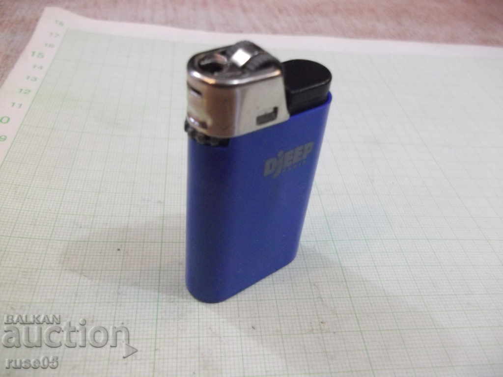 Δημοπρασία Djeep ελαφρύτερο αέριο με μαλακή φλόγα με βότσαλα