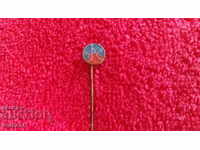 Old bronze badge social needle O U TESLA