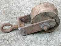 Old wooden reel, scraper, wrought iron