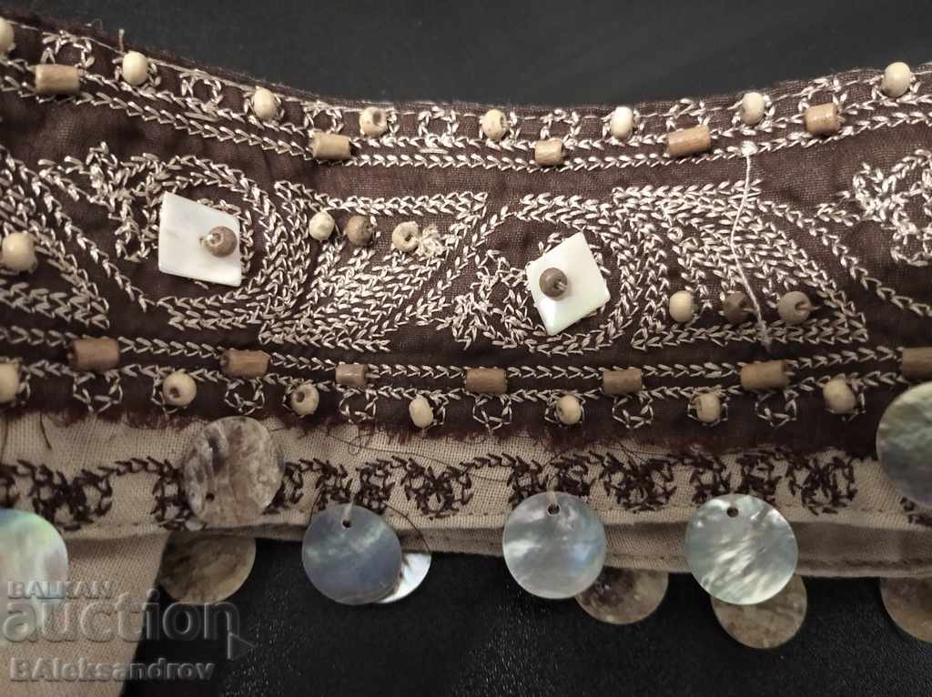 Delivery of Old embroidered belt with mother-of-pearl Delivery of Old embroidered belt with mother-of-pearl
