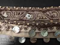 Old embroidered belt with mother-of-pearl