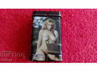 Old metal cigarette case with naked women erotica
