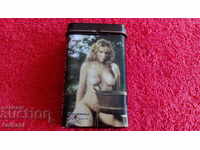 Old metal snuff box for cigarettes with nude women erotica