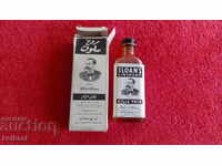 Old small bottle in packaging