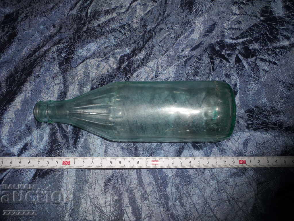 old glass bottle with price 10.00 BGN | € 5.11 old glass bottle with price 10.00 BGN | € 5.11