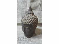 A spectacular ceramic replica of a Buddhist deity