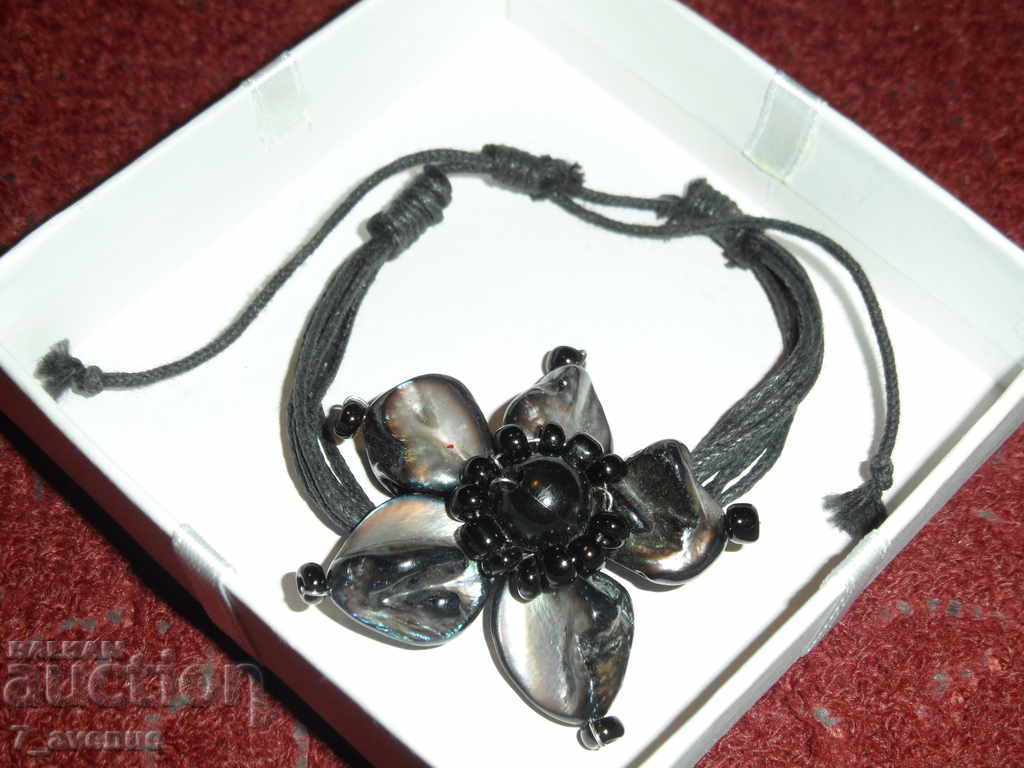 Bracelet with flower with price 12.99 BGN | € 6.64 Bracelet with flower with price 12.99 BGN | € 6.64