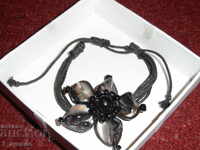 Hryvnia with a flower