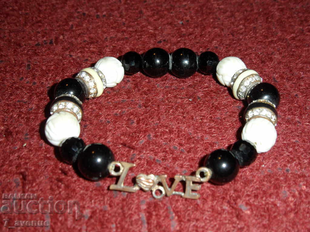 Auction Bracelet with pebbles and a message Auction Bracelet with pebbles and a message