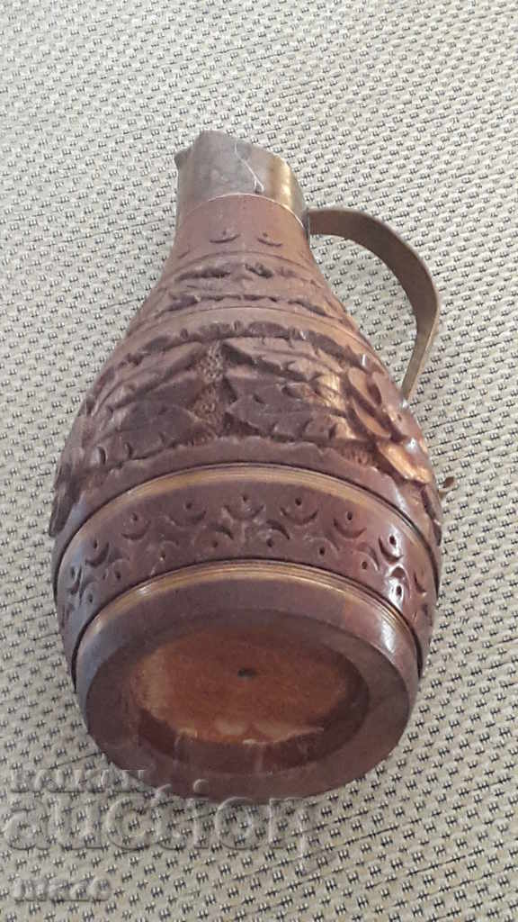 Auction Wooden hand-carved pitcher Auction Wooden hand-carved pitcher
