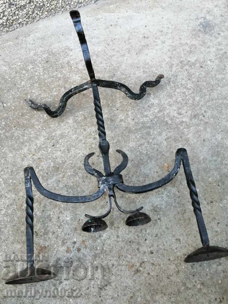 Auction  Old forged candlestick, candle