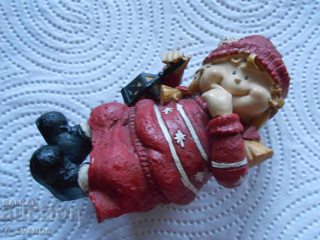 Delivery of A little cute figure - a sitting girl Delivery of A little cute figure - a sitting girl