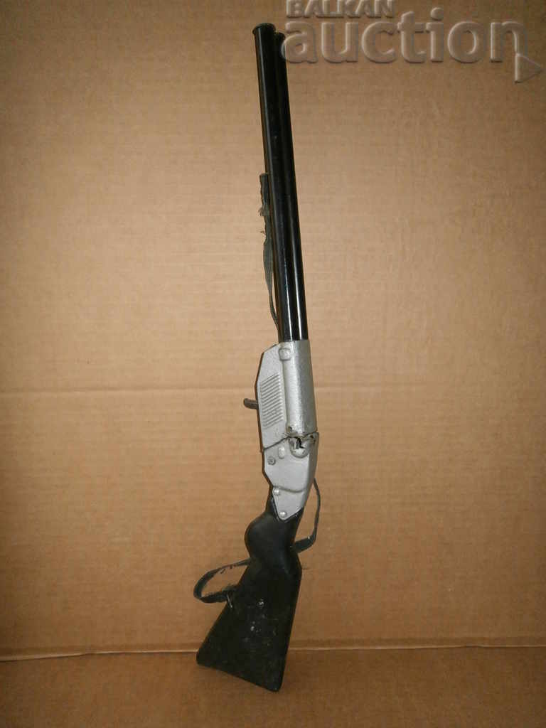 Auction metal tin toy hunting rifle Auction metal tin toy hunting rifle