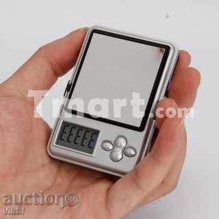 O miniatură cantar electronic 100 x 0,01 g tip Flapjack cu preț 20.00 BGN | € 10.23