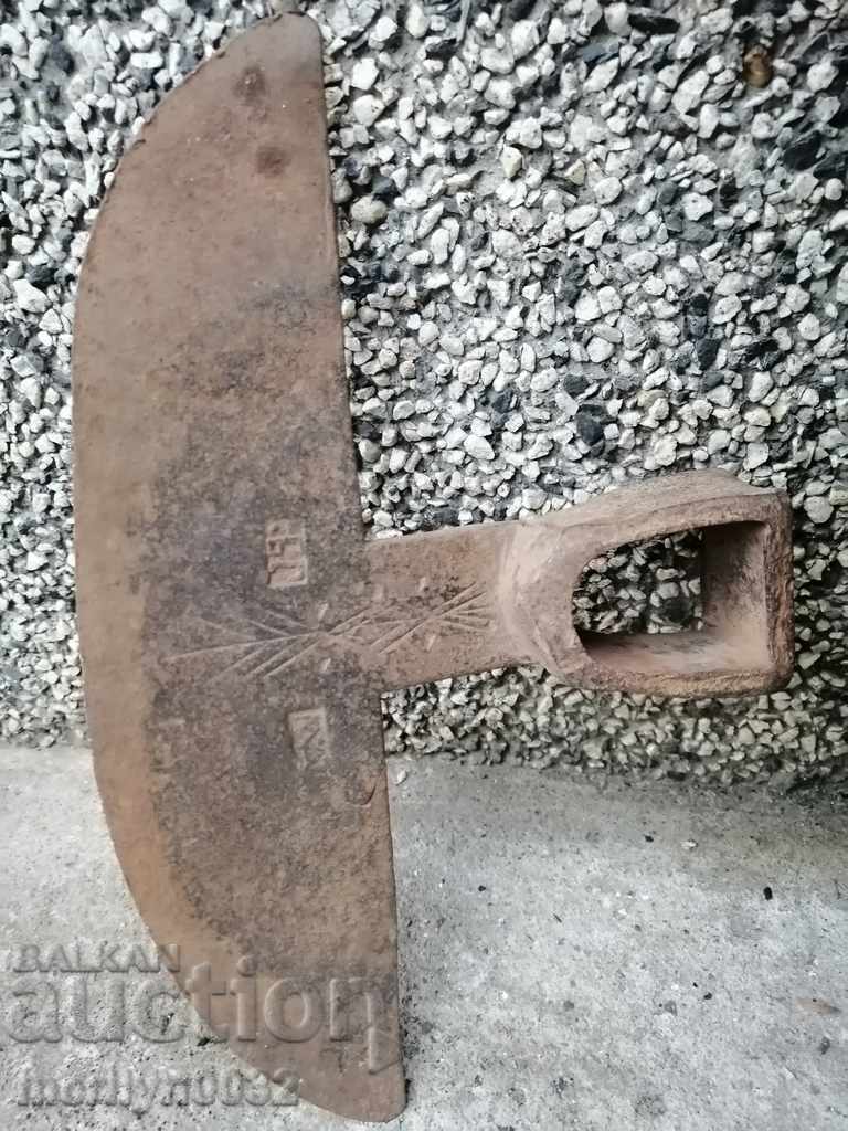 Old forged hoe, wrought iron tool