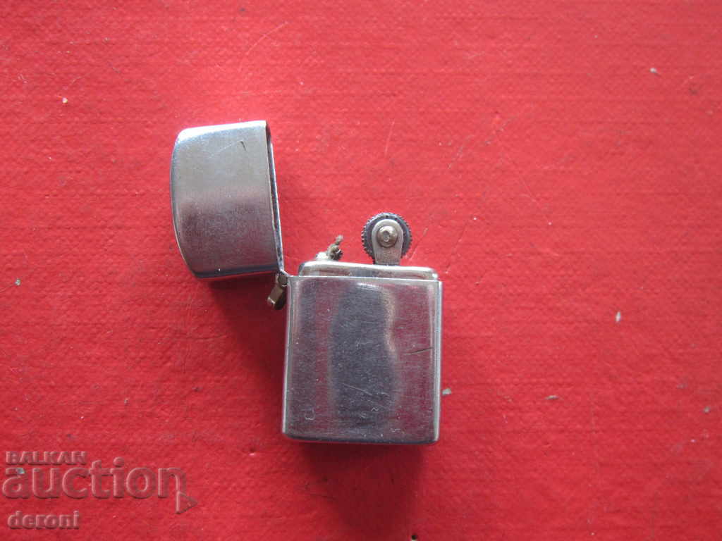 Auction Old Minion Petrol Lighter 2 Auction Old Minion Petrol Lighter 2