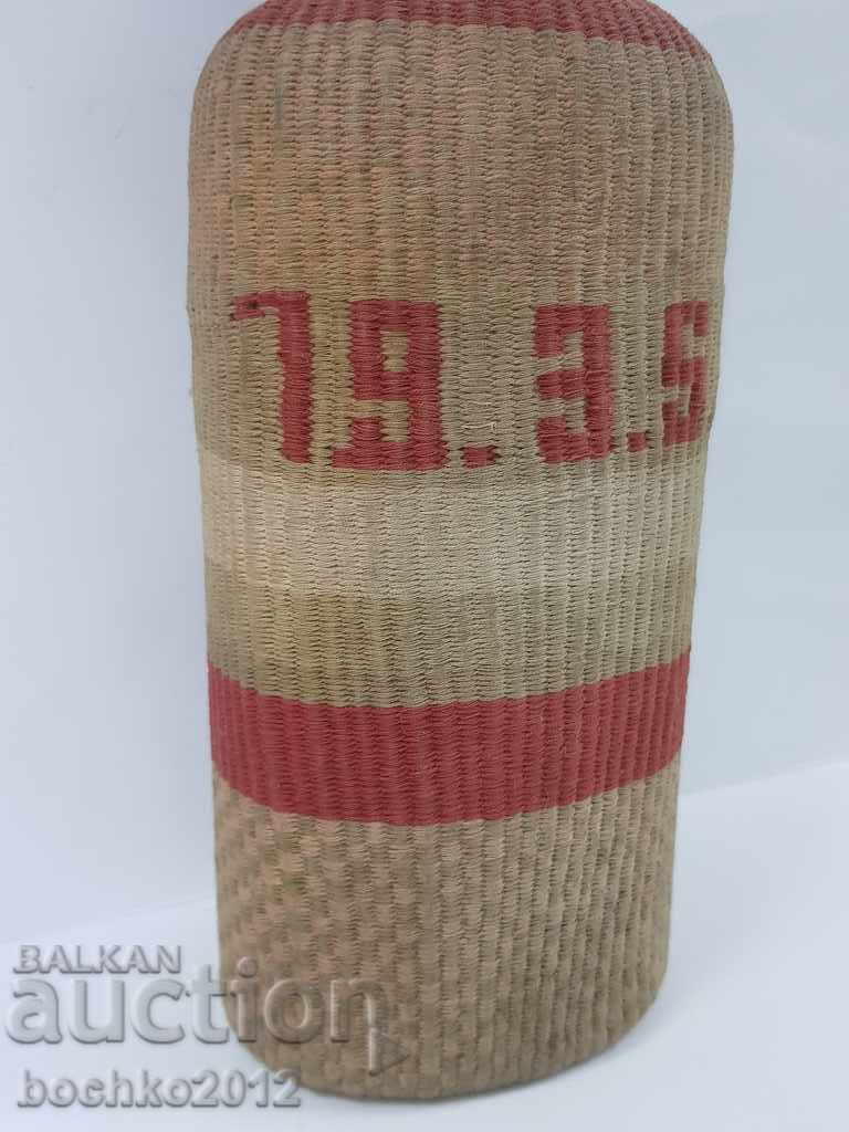 Hand-woven Bulgarian royal glass bottle 1935 with price 130.00 BGN | € 66.47 Hand-woven Bulgarian royal glass bottle 1935 with price 130.00 BGN | € 66.47