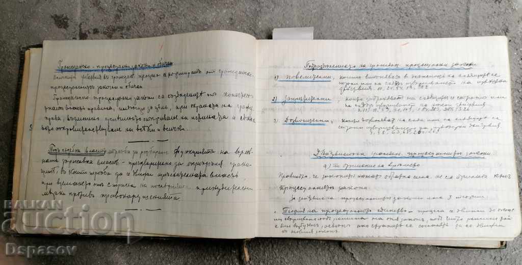 An Old Book With Handwritten Laws
