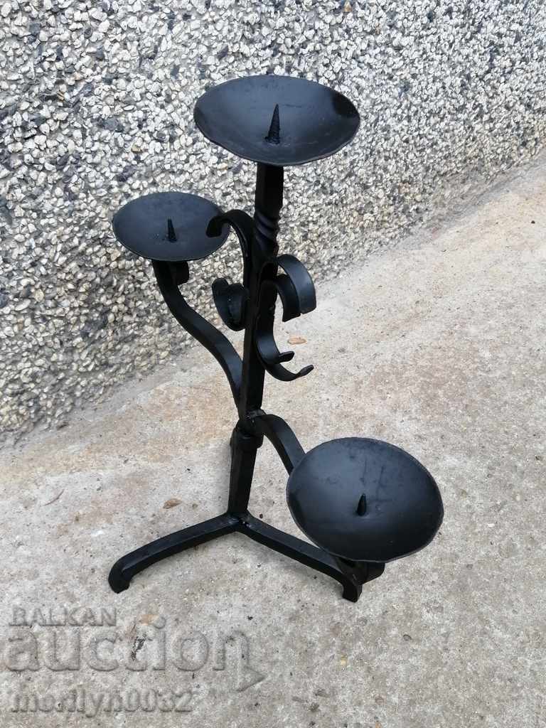 Delivery of Old forged candlestick, candle, candelabra Delivery of Old forged candlestick, candle, candelabra