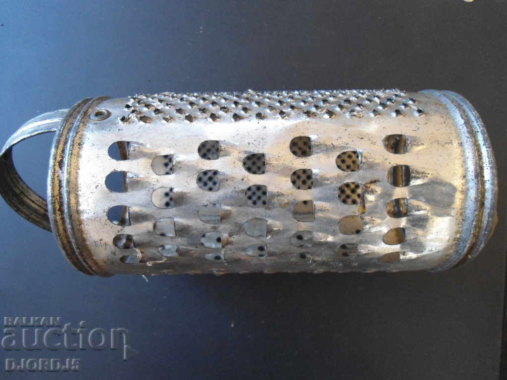 Old metal grater with price 4.00 BGN | € 2.05 Old metal grater with price 4.00 BGN | € 2.05