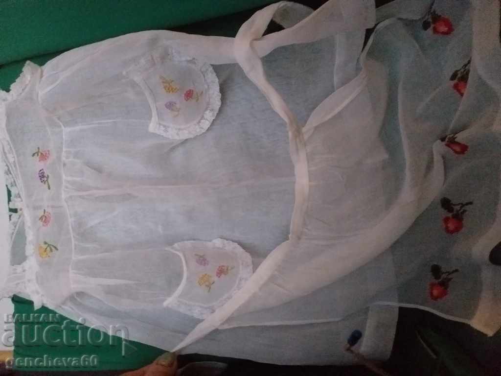 Delivery of The 50s. Authentic children's dress, apron, etc.