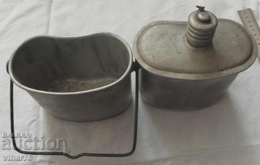 Auction An old military canteen with a can Auction An old military canteen with a can