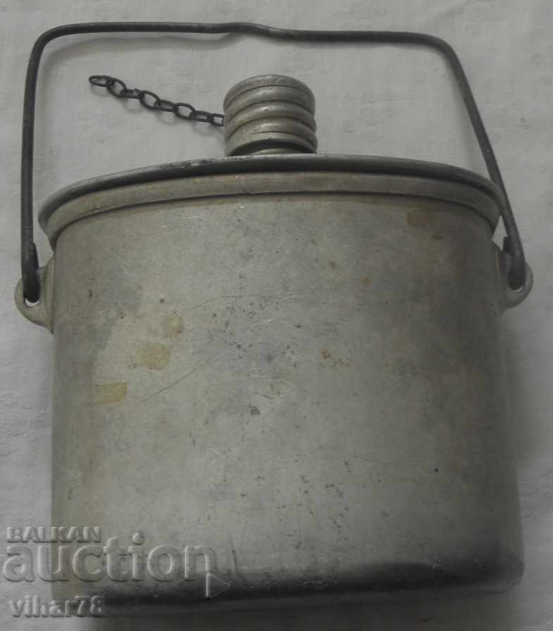 An old military canteen with a can - 5 An old military canteen with a can - 5