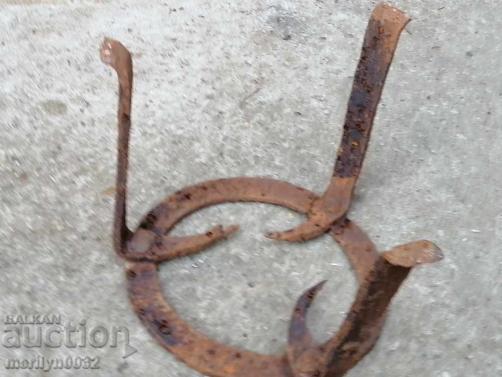 Auction  An antique wrought iron soot hearth grilled pyruvic wrought iron