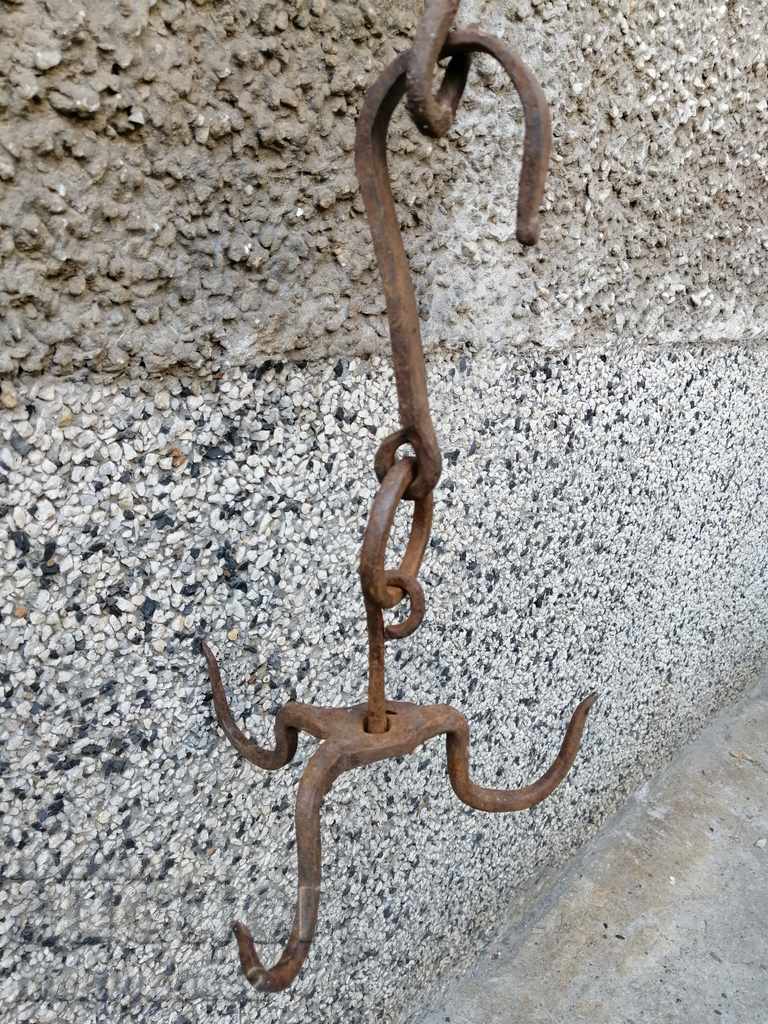 An antique forging hook, triple harness