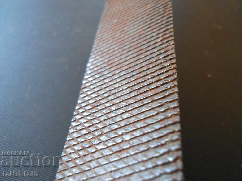 Delivery of Old iron file, triangular, marked