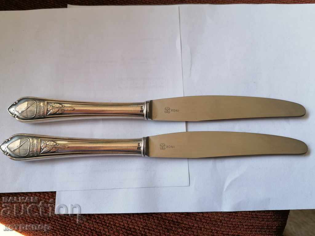 2 knives silver handles marked 2 knives silver handles marked