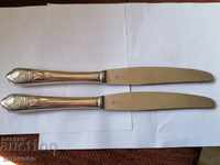 2 knives silver handles marked
