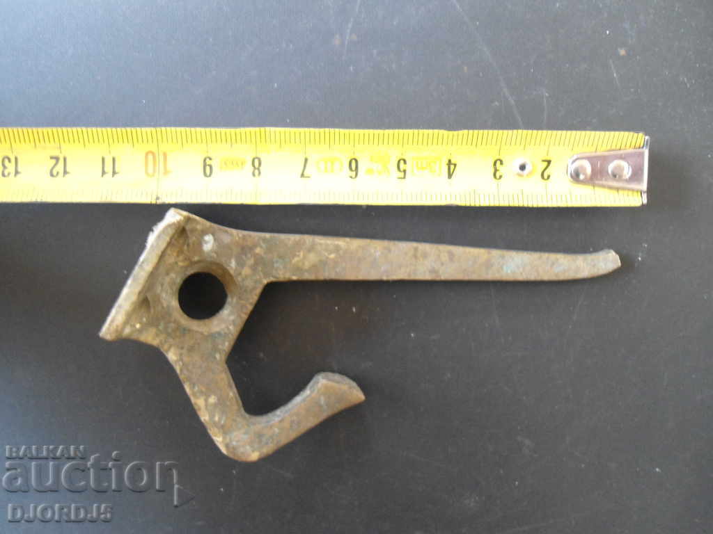 Auction  An old metal hanger