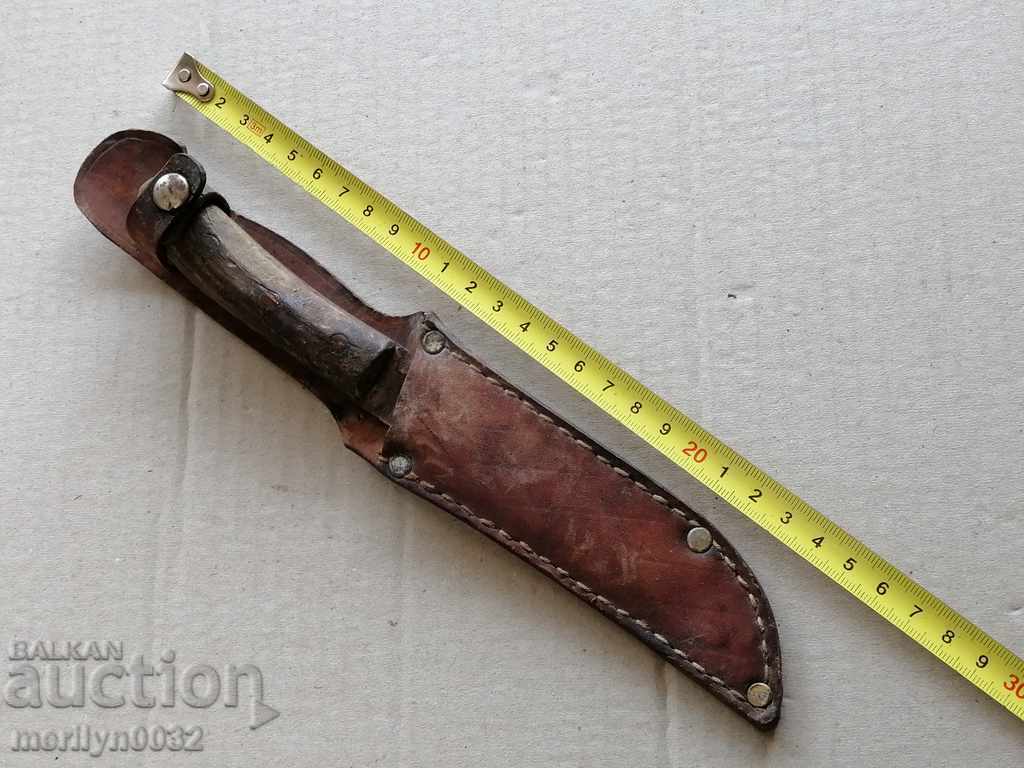 An old knife with a jug