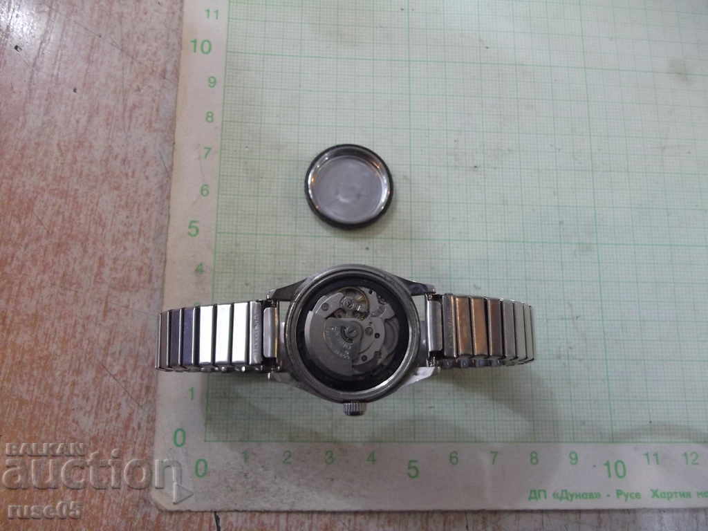 Delivery of Clock "ORIENT" automatic machine manual with chain ladies working Delivery of Clock "ORIENT" automatic machine manual with chain ladies working